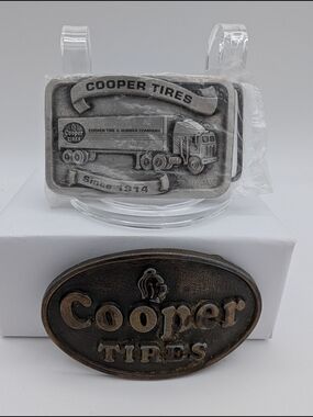 2 Cooper Tires Belt Buckles 80th Anniversary Vintage Pewter 1994 + 1970s Bronze